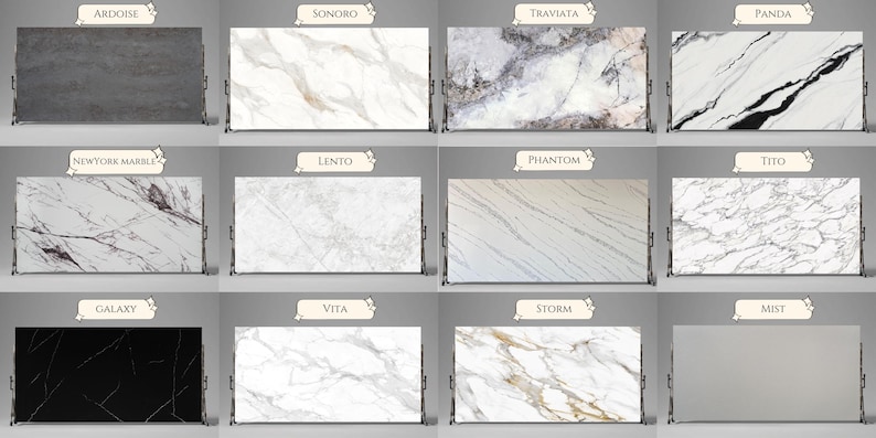 May include: A display of twelve rectangular stone slabs with various marble patterns. Each slab is labeled with a name, showcasing a range of colors from dark gray to white and black, with veining details.