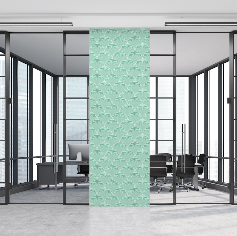 May include: A teal blue wallpaper with a repeating pattern of white stylized fans. The wallpaper is shown in a modern office setting.