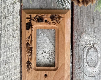 Wooden GFI wall plate cover wood burned long pine and cones