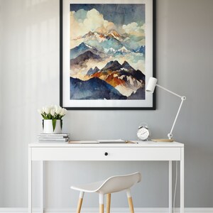 May include: A white desk with a drawer and a white chair. A framed watercolor painting of mountains and clouds hangs on the wall above the desk. A white lamp is on the desk, and a white alarm clock is on the desk.