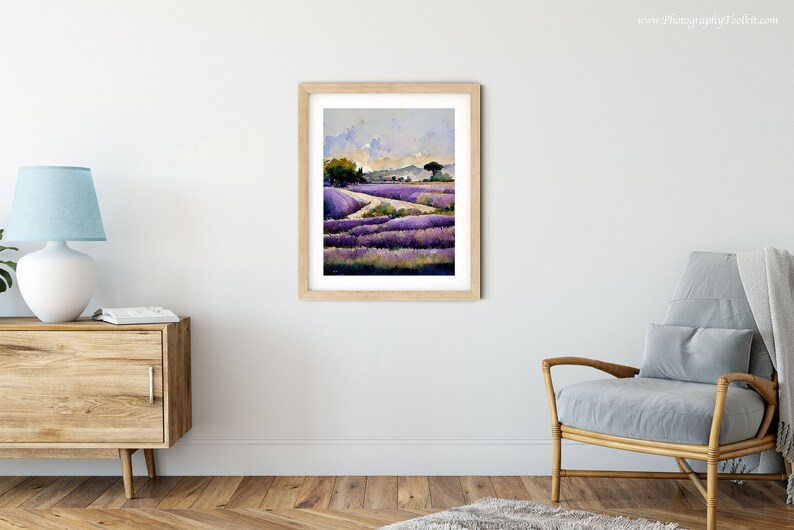 May include: A watercolor painting of a lavender field with a winding path leading to a small tree in the distance. The sky is a soft blue with white clouds.