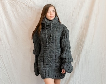 Gray chunky winter sweater made of wool with giant turtleneck