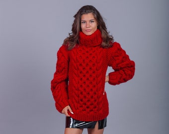 Bulky red oversized wool sweater with huge warm turtleneck, great for ski resort holiday