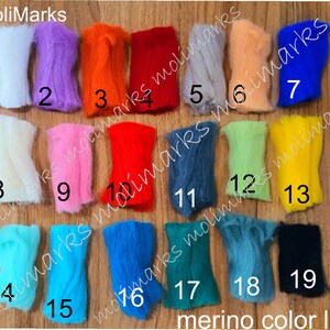 May include: A colour chart of 19 different shades of merino wool. The wool is arranged in rows of three, with each shade numbered from 1 to 19. The chart is labelled "merino colour list".