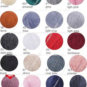 May include: A colour chart of mohair yarn with 18 different colours, including cream, emerald, grey, light pink, terra, blue, light blue, light grey, dark grey, white, red, bordeaux, black, stone, coal grey, powder, rose, powder pink, navy, denim melange, grey melange, mint, mink, and saffron.