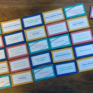 Printable chore cards: simple graphics in navy, coral, sunflower, and teal.