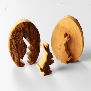 Easter decoration Easter bunny in egg with bark Rabbit made of wood Easter spring decoration Table decoration made of olive wood