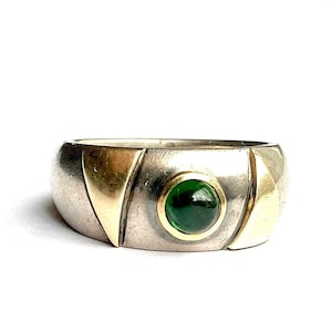 Forged ring with green tourmaline and triangle