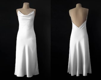 White satin dress. Midi backless wedding dress simple