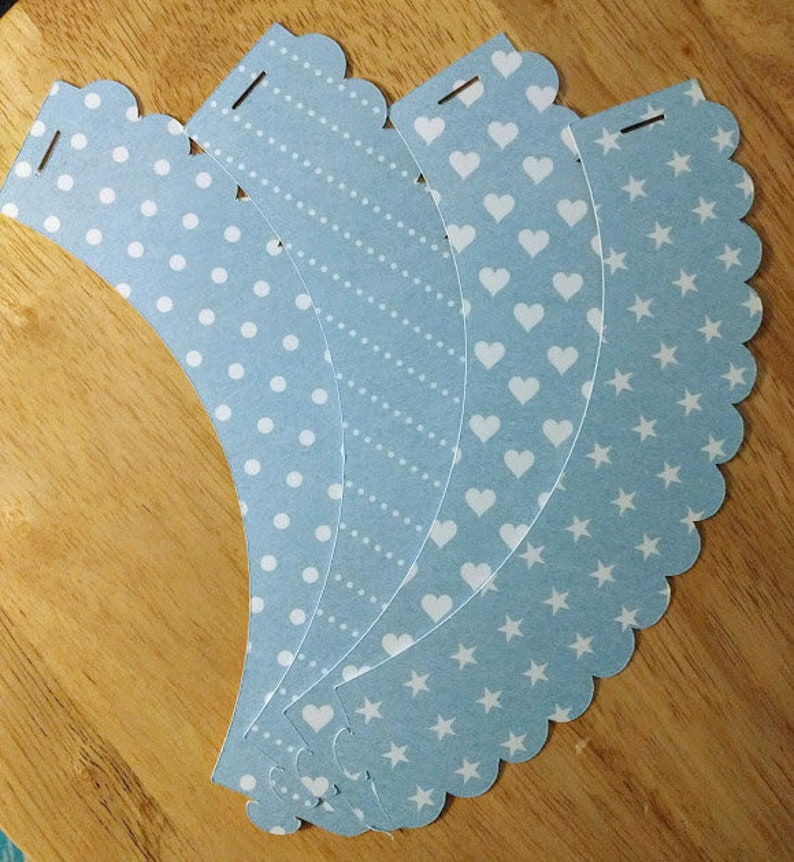 Scalloped 12 count Hearts and Stars Cupcake Wrappers Light Blue