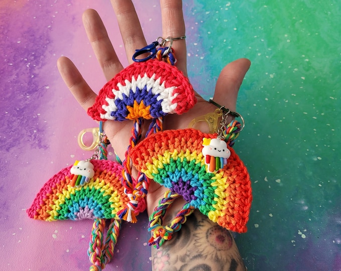 Rainbow pendant keychain in 3 different colors.