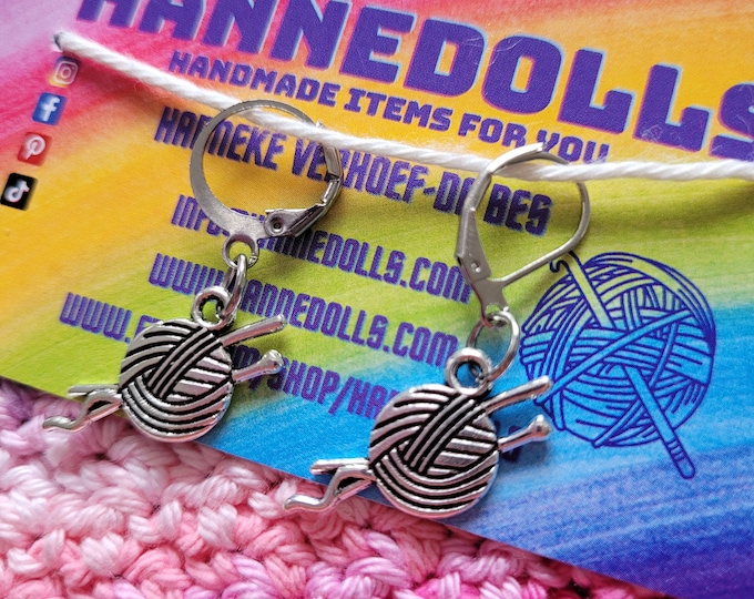 Stitch marker ball of wool with knitting needles. These stitch markers are sold individually