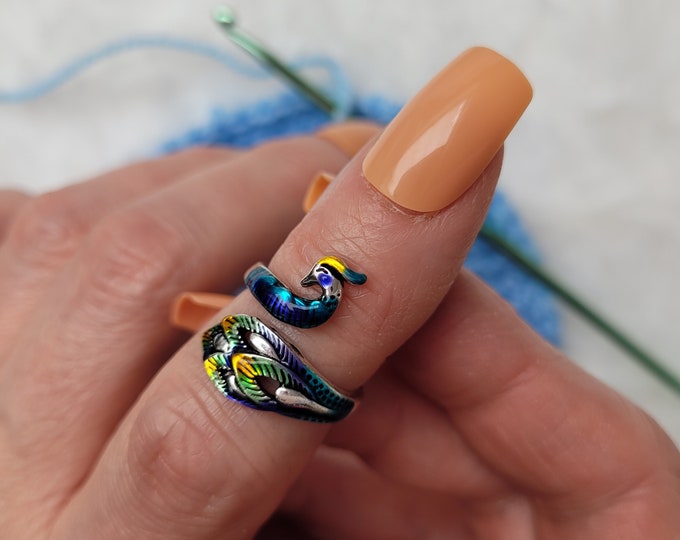 Colored Peacock Crochet or Knitting Ring a yarn tension aid for crocheting and knittingThis is a right-handed crochet/knitting ring.