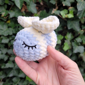 Crocheted light blue bee