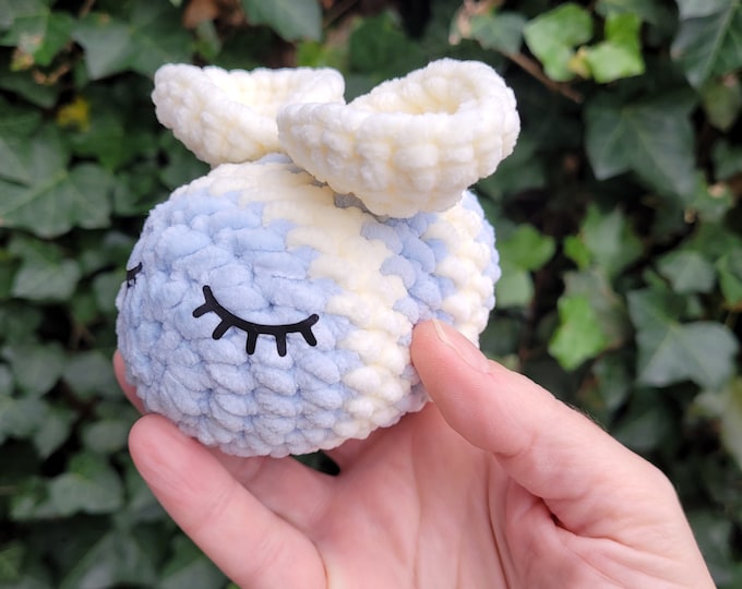 Crocheted light blue bee