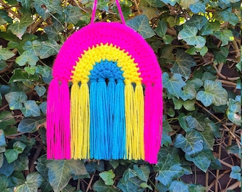 Crocheted rainbow pendant in the colors of the pansexual flag