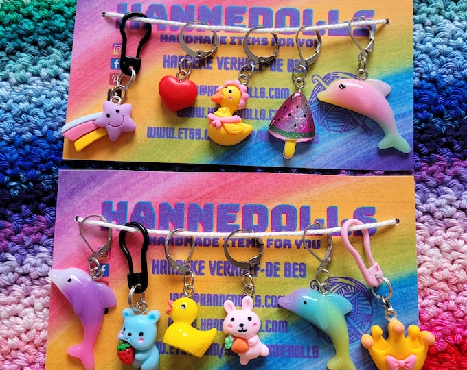 stitch markers star, heart, melon, rubber ducks, dolphins, crown, rabbit and bear. these stitch markers are sold individually.