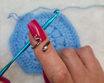 This ring helps you keep the yarn tension neatly, so your stitches stay even. Crochet or knitting ring