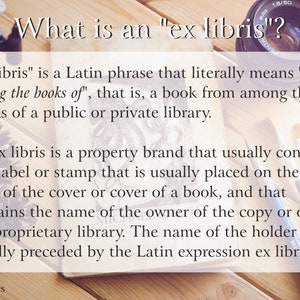 May include: A close-up of a book with the text "What is an 'ex libris'?" and a description of what an ex libris is. The book is on a wooden surface with a camera lens, paintbrushes, and a pine cone.