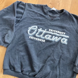 Champion sweater top ottawa letra