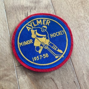 Zeldzame 1957-58 Aylmer Minor Hockey Association Flocked Patch Vintage jaren 1950 Aylmer Flames Sports Collectible Memorabilia Badge Elgin County