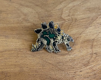 Vintage emaille pin STEGOSAURUS jaren 80 retro dinosaurus pinback