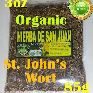 May include: A clear plastic bag filled with dried green herbs labeled "Organic Hierba de San Juan St. John's Wort" with a green leaf logo and USDA Organic seal. The bag is labeled with the text "Hypericum Perforatum" and instructions for use. The bag is 3 oz and 85g.