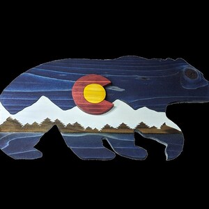Handcrafted Colorado bear cut with a scroll saw and laser engraved