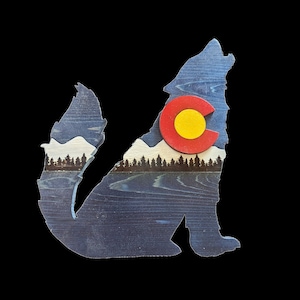 Handcrafted Colorado wolf made from cedar and cut with a scroll saw and laser engraved