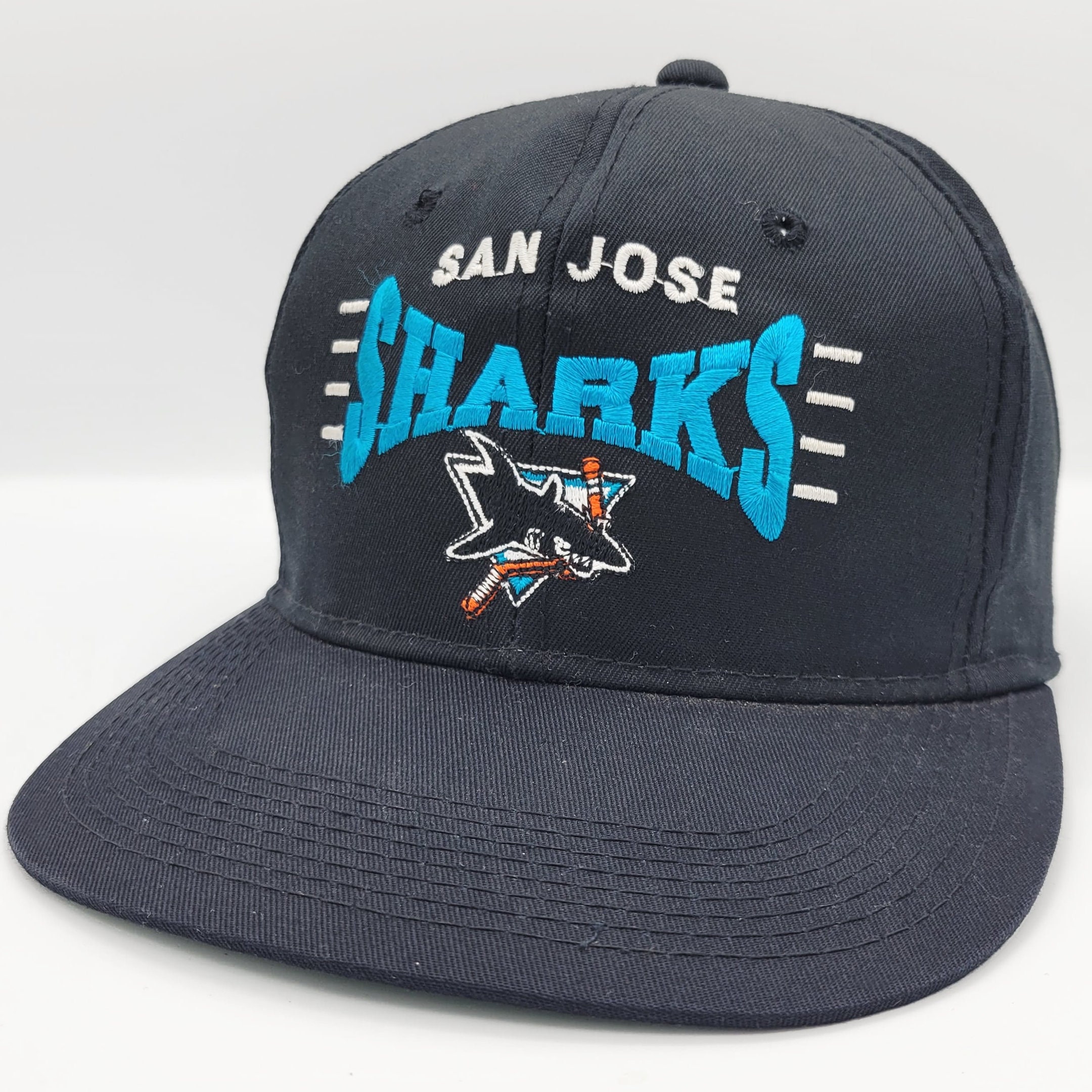 Gyönyörű nő láva Tapasztalt személy san jose sharks caps 90s átmérő ...