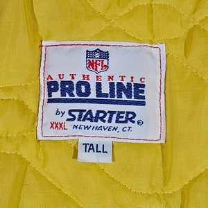 May include: White tag with blue and red stitching, featuring the NFL logo and the text "Authentic Pro Line by Starter&reg; XXL New Haven, CT. Tall".