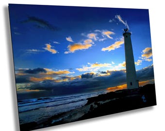 Barbers Point Beach Park Lighthouse: Capturing a Stunning Oahu Sunset Amidst Golden Clouds and Palm Fronds at the Edge of Paradise