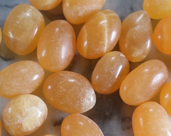Orange Calcite Tumbles