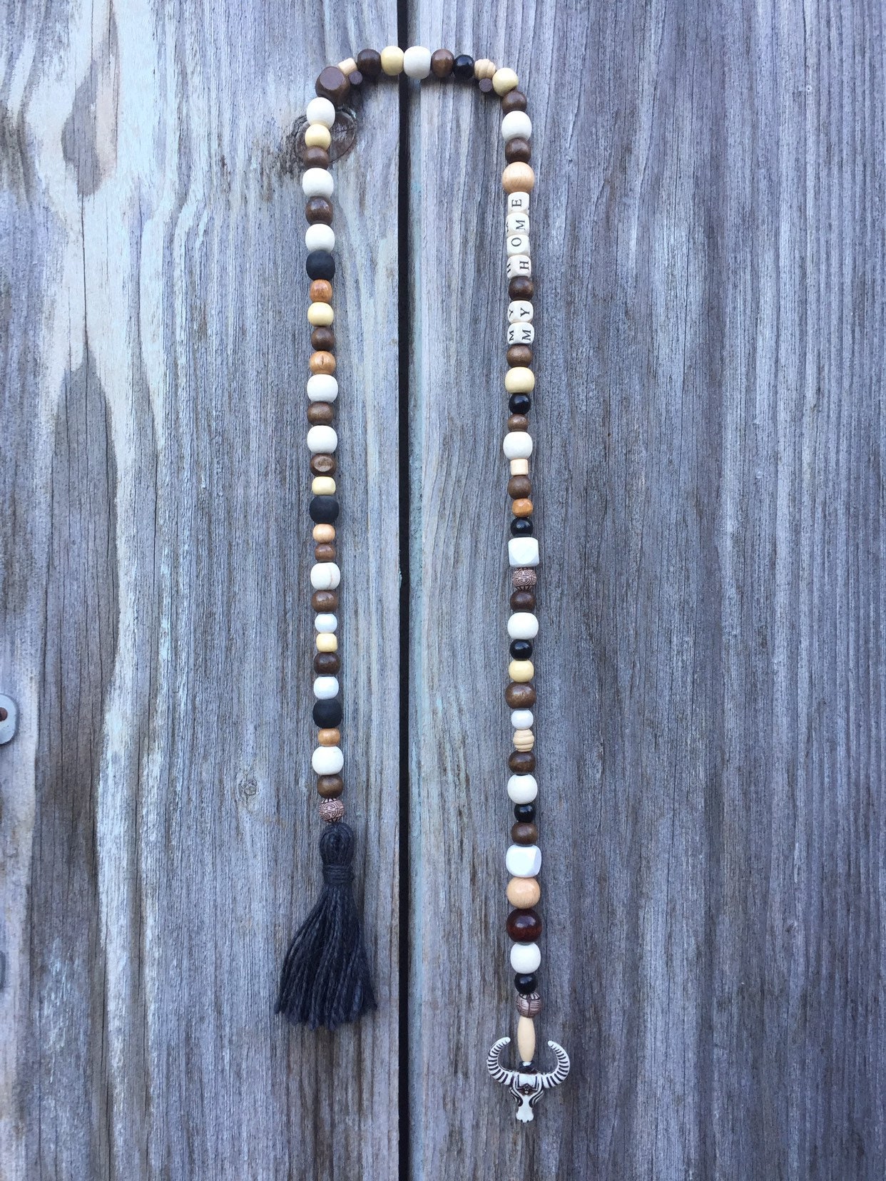 Guirlande Tête d'animal et Pompons Gland