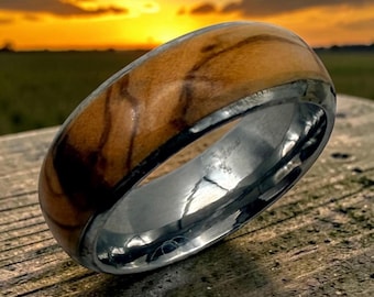 Bethlehem olive wood ring handmade stainless steel and olive wood.