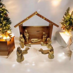Bethlehem olive wood modern style nativity set with cedar wood Stable Manger LED lights engraved figures with Bethlehem and jerusalem