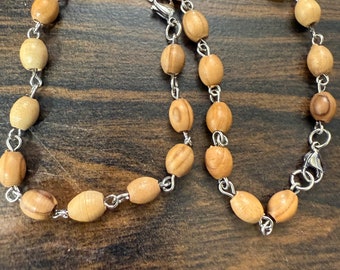 Handmade from Bethlehem olive wood beads bracelet available in size 6" to 7.5"