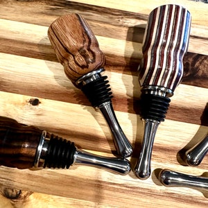 handmade wooden wine bottle stoppers hand turned from hard wood with stainless steel