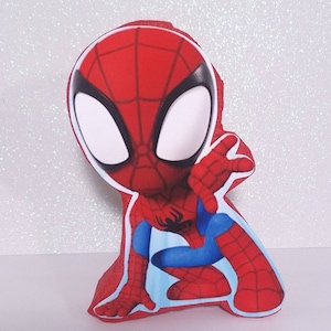 May include: Red and blue 3D foam cutout of a cartoon Spiderman character with a white background.