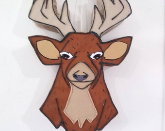 fête d'anniversaire sur le thème des cerfs, inspirée par une piñata en forme de cerf