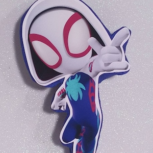 May include: A white and blue cartoon character with a red spider symbol on its face. The character is wearing a blue and white suit with a palm tree design. The character is in a jumping pose with its right arm raised.