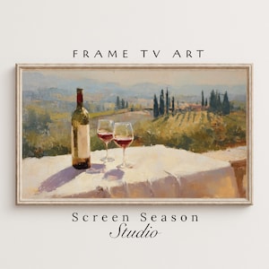 Puede incluir: Pintura al óleo enmarcada de un paisaje toscano con una botella de vino y dos copas sobre un mantel blanco. La obra de arte incluye el texto "FRAME TV ART" y "Screen Season Studio".