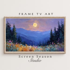 Könnte beinhalten: Gerahmter Kunstdruck mit einer Berglandschaft bei Mondschein. Das Kunstwerk zeigt eine lebendige Farbpalette aus Blau-, Lila- und Gelbtönen. Der Text "FRAME TV ART" und "Screen Season Studio" sind zu sehen.