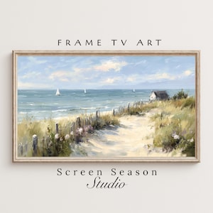 Puede incluir: Impresión artística enmarcada que representa un paisaje costero con un camino arenoso que conduce a una pequeña casa. La obra de arte representa una playa con veleros en el agua bajo un cielo azul. El texto "FRAME TV ART" y "Screen Season Studio" son visibles.