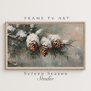 Könnte beinhalten: Gerahmter digitaler Kunstdruck mit einer Winterszene. Das Kunstwerk zeigt schneebedeckte Tannenzapfen und Äste. Der Text "FRAME TV ART" steht oben und "Screen Season Studio" unten.