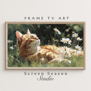 May include: A framed art print featuring a ginger cat basking in sunlight amidst daisies and tall grass. The artwork has a vintage aesthetic, with the text "FRAME TV ART" at the top and "Screen Season Studio" at the bottom.