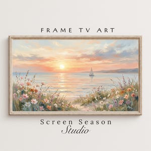 Puede incluir: Pintura de paisaje enmarcada de una puesta de sol sobre el océano. La obra presenta un velero, flores y el texto "FRAME TV ART" y "Screen Season Studio". La paleta de colores incluye tonos de naranja, rosa y azul.
