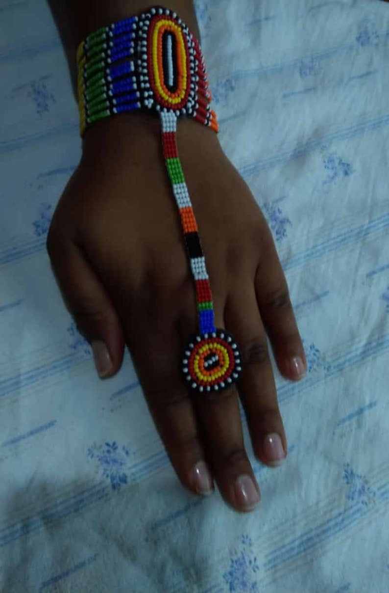 muliticolor jewelry Kenya handmade bracelet,wristhand jewelry attached to a ring Masai beaded bracelet with a ring