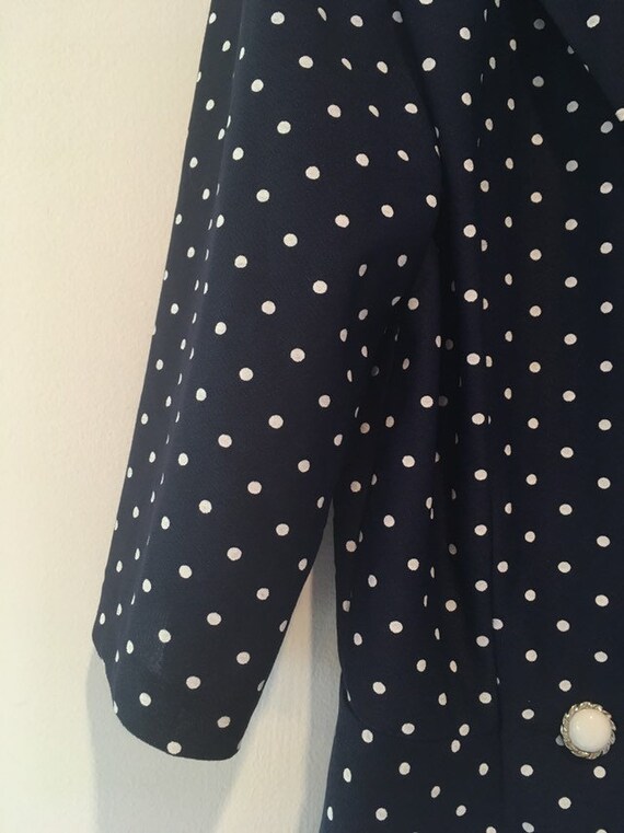 white and navy polka dot blouse
