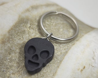 black statement keychain, skull motif